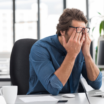 Tired Man on Computer